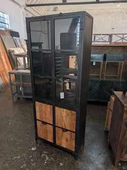 Tall iron and mango wood cabinet