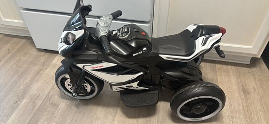 Moto eléctrica para niños