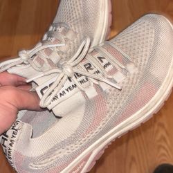 Pink,white and gray running shoes