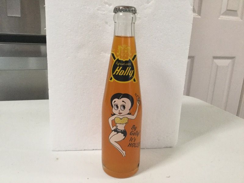 Vintage 1975 ACL Holly Soda Pop Bottle. 7oz bottle. FULL and UNOPENED. By Golly its Holly aka Betty Boop.