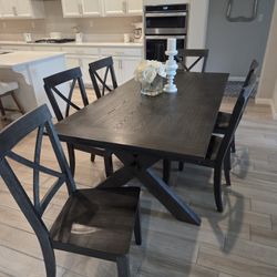 Wood Dining Set. Used, in good condition. 

Dining Table 
78"L x 40"W x 30.5"H 

6 Chairs 

Decor Not Included 

$525