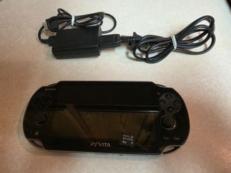 Ps vita 1101 wifi+3g 4gb card and charger
