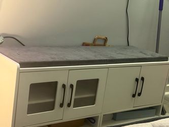 White bench with cabinets and LED lights