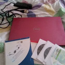 Pink dell 15.6 inch laptop.