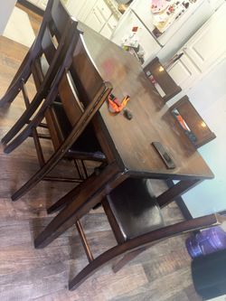 Table with 5 chairs -Needs some love Read description Price Negotiable