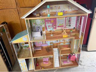 Girls life size wooden dollhouse