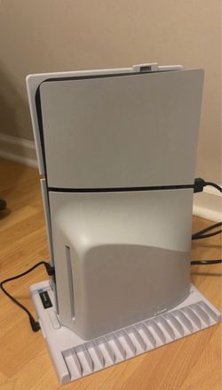 PlayStation 5 Digital edition with control, fan accessory and headphones