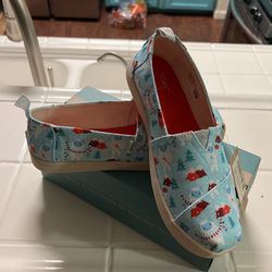 Brand New Never Used It. Toms Size 4 Y. Asking $35 Firm. I Can Deliver.