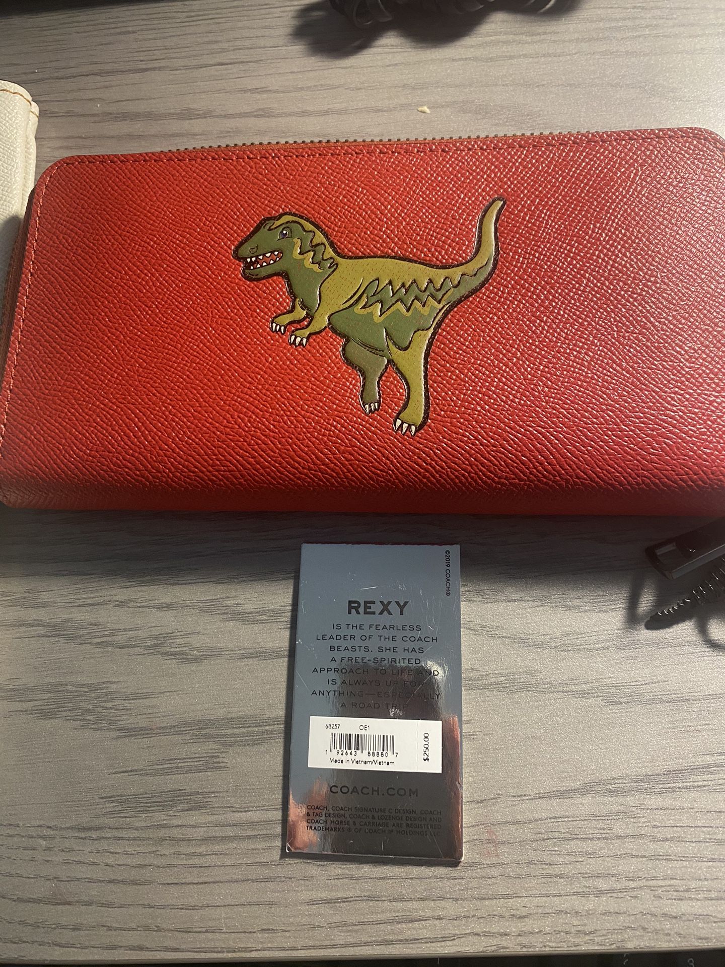 Coach outlet wallet dinosaur