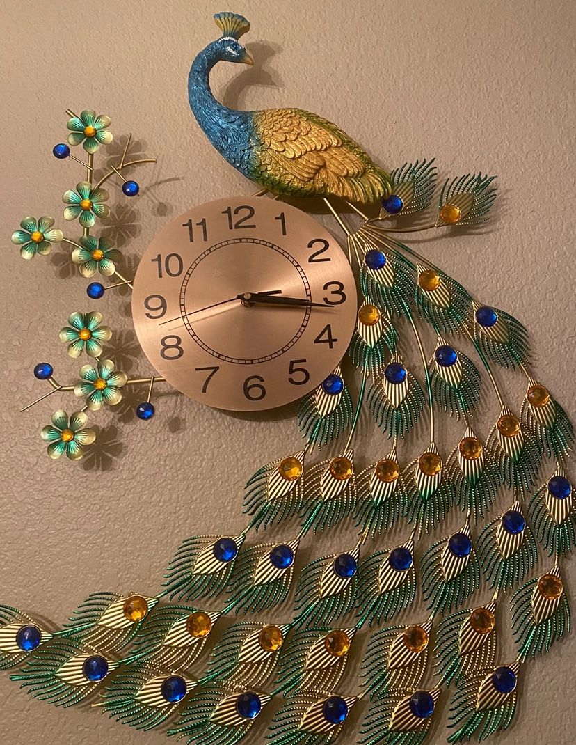 Peacock Clock. 👌
