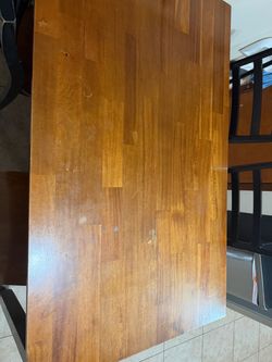 Wood table with 4 chairs and bench