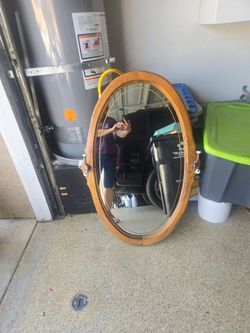 Oval Wood Framed Wall Mirror