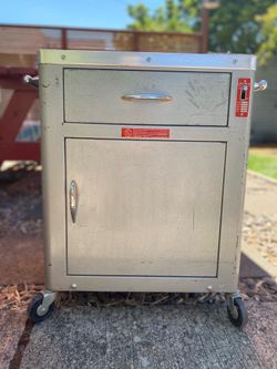 Metal cabinet with wheels