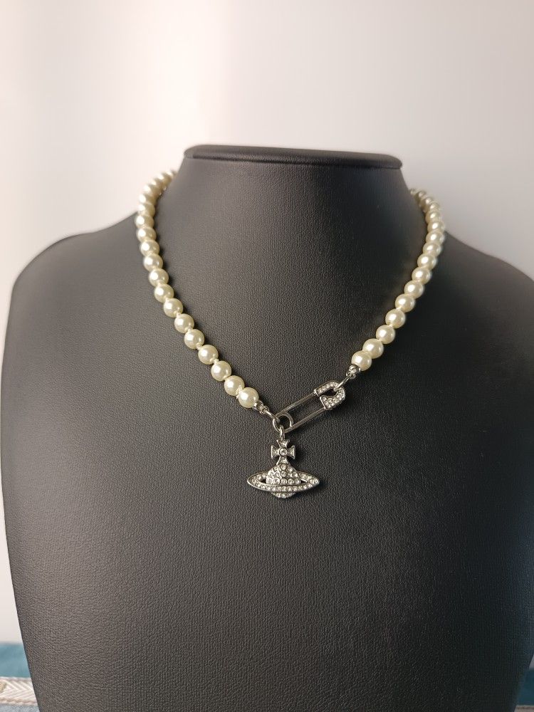 Brand new single strand pearl necklace