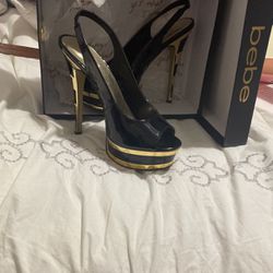 Bebe Heels Blk And Gold Size 9
