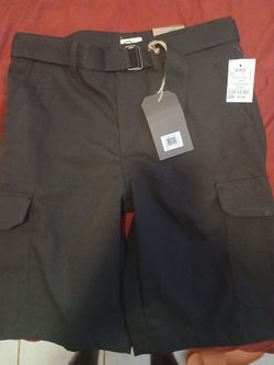 black cargo shorts by the brand iZOD
