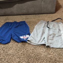 Grey And Blue Shorts , The Grey One Is New And The Blue Shorts Is Slightly Used Both Sized Small Men’s 