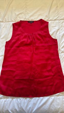 Red sleeveless blouse