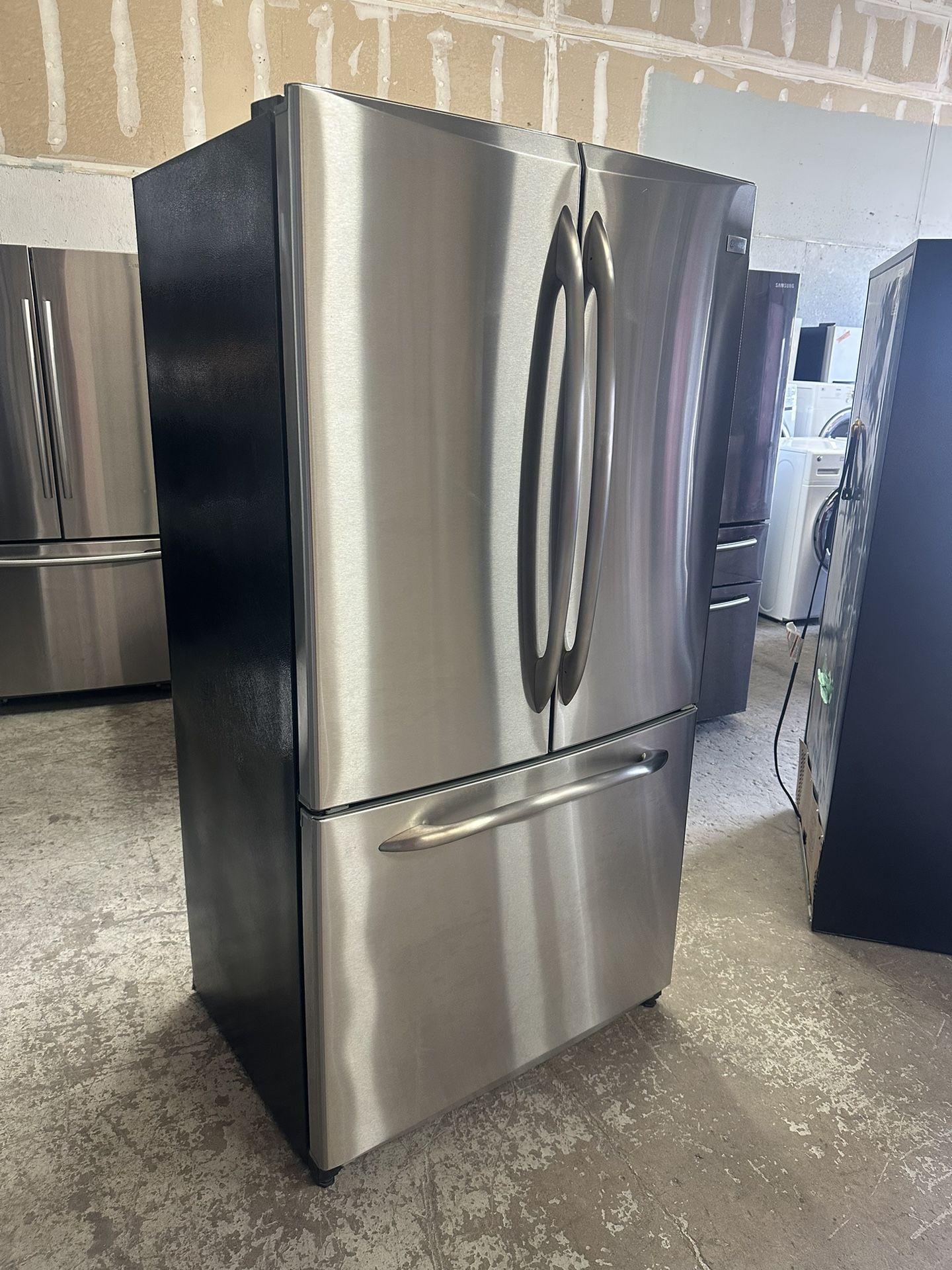 Cabinet deep GE French door with ice can deliver