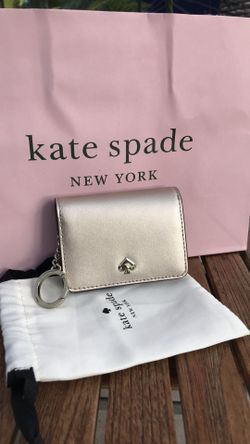 Brand new with tags Kate Spade slim bifold card holder wallet. Never used! Dust bag and shopping bag included! • Material: Leather • Small card h