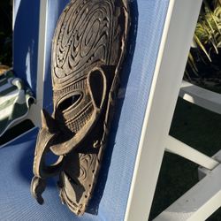 Hand-carved wooden spirit mask