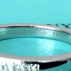 Tiffany & Co. 2.5 mm Platinum and Diamond channel set ½ eternity wedding band, Size 4