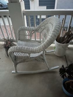 Rocking white chair with rocking leg  rest