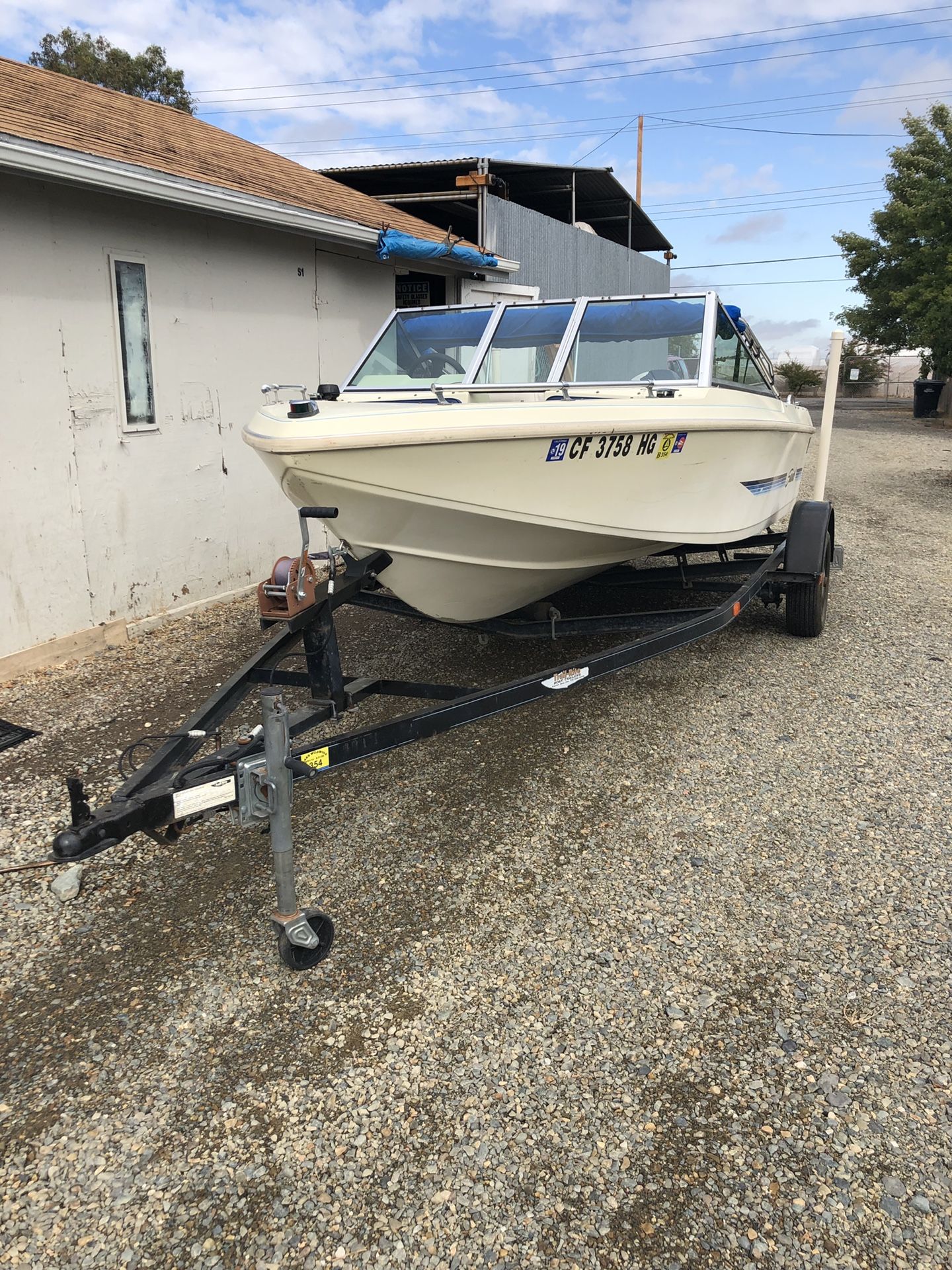 1984 sea swirl boat and trailer