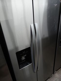 Whirlpool stainless steel side by side refrigerator - Free delivery