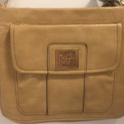 KK Anne Klein neutral beige and gold women’s crossover handbag, outer flap, zippered pocket and interior zippered pocket with long strap. Wear at both