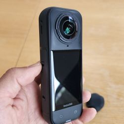 Insta 360 X5 with Photo Grip