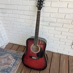 Acoustic Guitar And Capo