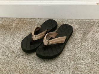 Brown flip flops