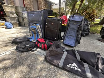 Used Suite case && Duffle Bags $5 Each!
