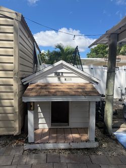 Large Wooden Dog House with Covered Porch