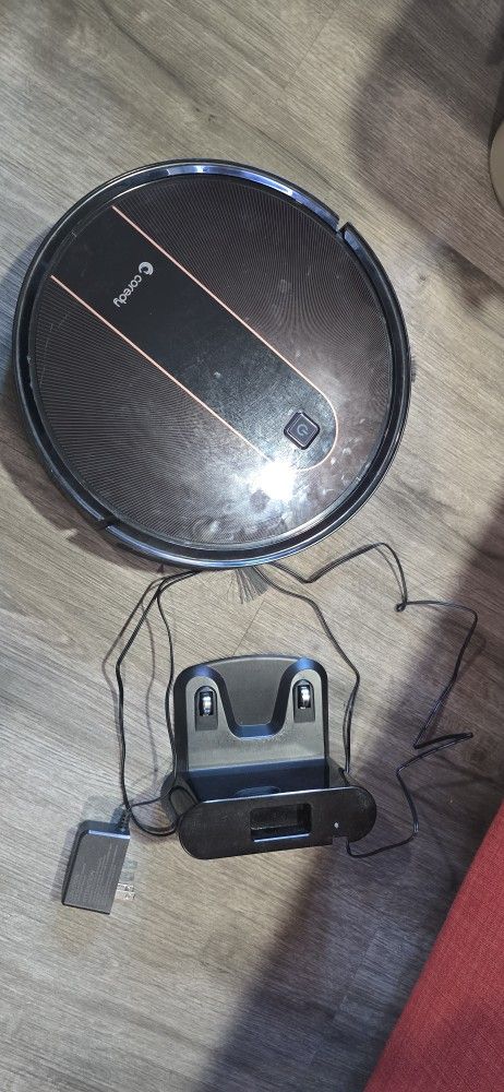 Malfunction (not working)  Coredy R750 robot vacuum cleaner for parts or fix up 
Runs a little and stops with red light. Sold as it is
