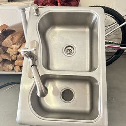 Sink with faucet