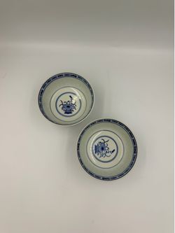 Vintage Chinese Jingdezhen porcelain bowls blue and white floral design with rice pattern. Set of 2