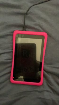 medium size tablet with pink cover it still works fine and it’s in good condition