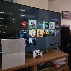 Xbox One S with Resident Evil Village, Resident evil 5 Injustice and more