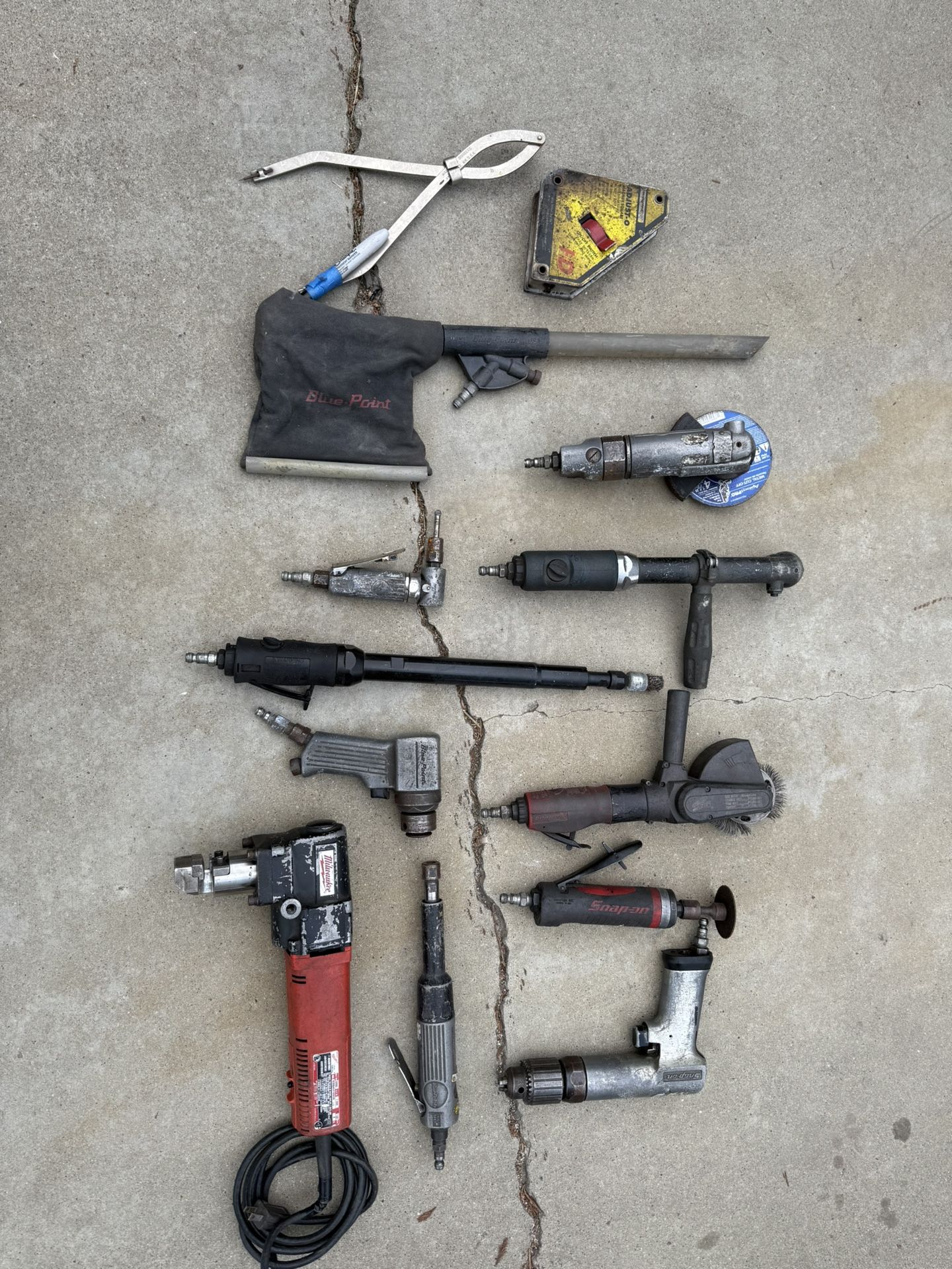 Miscellaneous air tools from body shop and Milwaukee nibbler, snap on, blue point