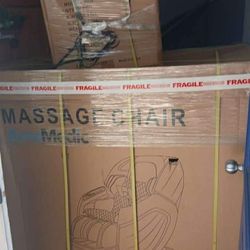 Brand new massaging chair in box