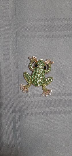 Gold tone Frog Brooch with green stones