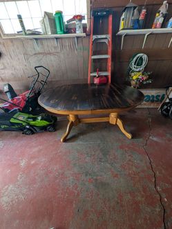 Vintage Double-pedestal oak oval dining table with leaf.