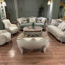  1 Big Sofa, 1 love seat, 1 chase, 2 chairs and coffee table with beautiful marble top. (Price of this elegant furniture is 6500 USD.)  LOOK UP This c