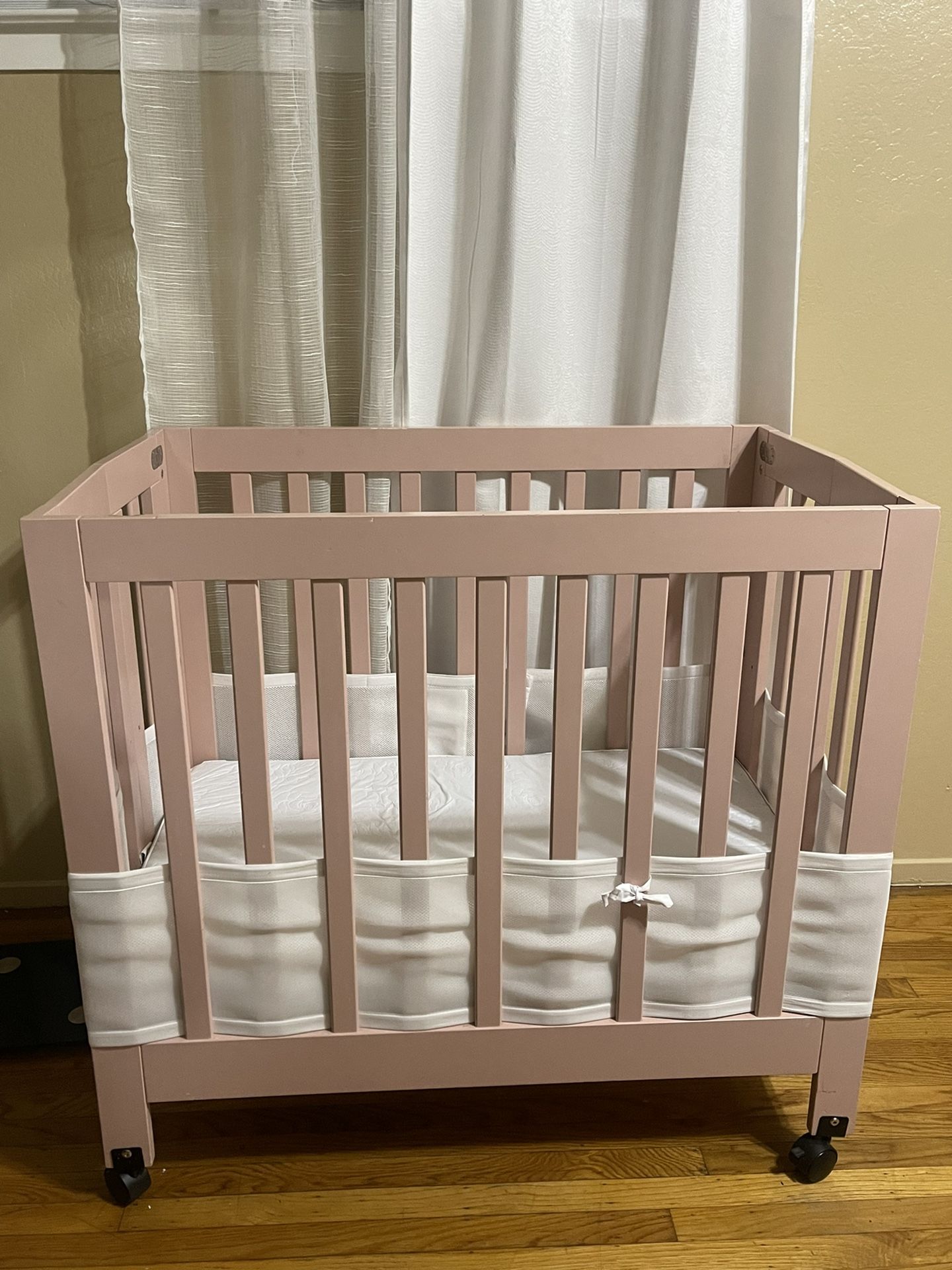 Pretty Blush Pink Babyletto Mini Crib