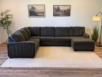 Ashley furniture charcoal gray sectional couch delivery available
