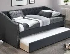 Twin twin size charcoal daybed with orthopedic mattress included
