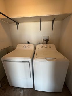 GE top-loading washer and front-loading gas dryer