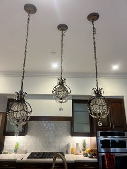 Custom kitchen glass chandeliers.